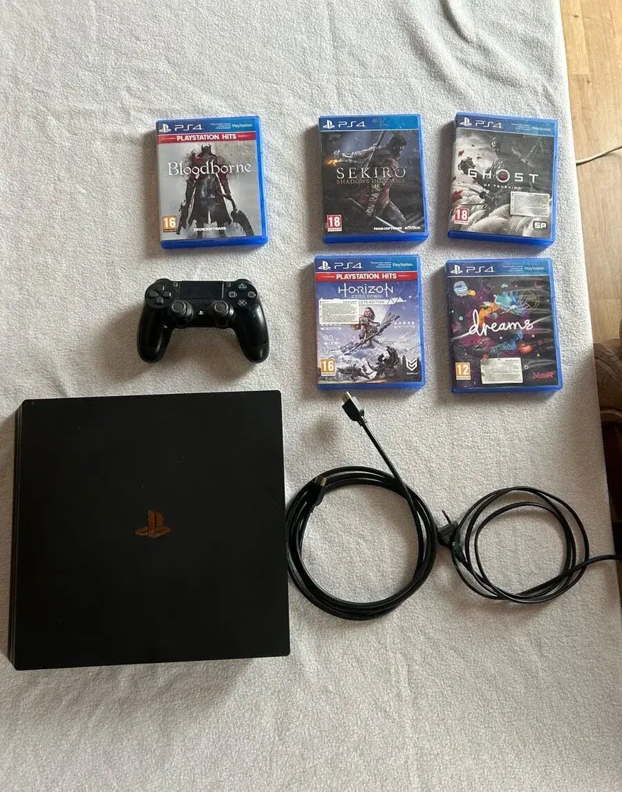 PS4 PRO + Hry (v popisku)