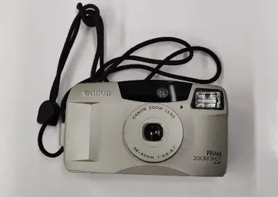 Kinofilmový kompakt Canon Prima Zoom Shot AiAF