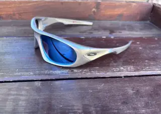 Brýle Oakley Neoforma X-Silver Prizm Deep Water Polarized