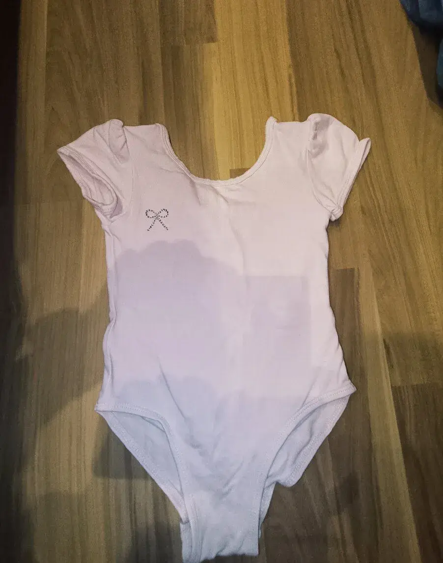 Gymnastický dres velikost 104