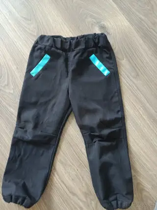 Softshellové kalhoty velikost 104