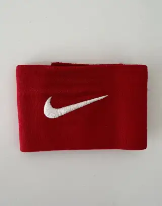 Nike úchyt, páska na chrániče