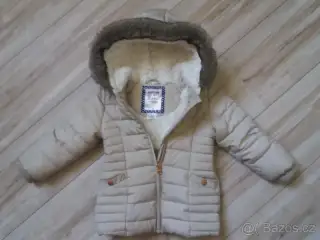KRÉMOVOU BUNDIČKU