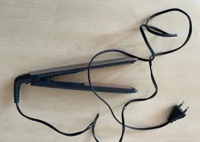 Kulma - žehlička na vlasy Remington