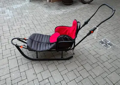 Dětské sáně nové s pytlem.