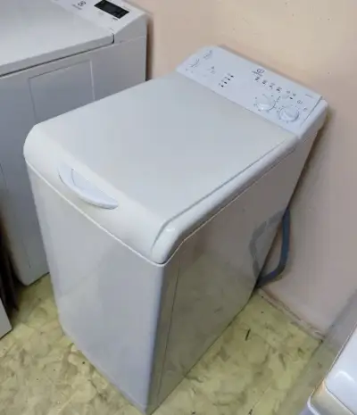 Pračka s horním plněním Indesit 5 kg., 800 ot/min, A