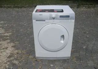 ZNAČKOVÁ SUŠIČKA PRÁDLA S TEPELNÝM ČERPADLEM AEG-7KG,tř.A+