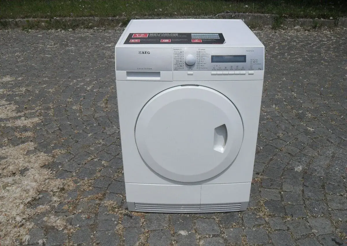 ZNAČKOVÁ SUŠIČKA PRÁDLA S TEPELNÝM ČERPADLEM AEG-7KG,tř.A+