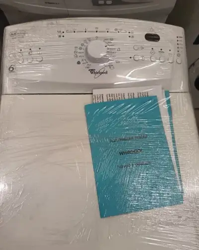 vrchem plněná pračka Whirlpool