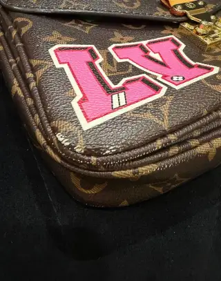 Louis Vuitton Pochette Métis Monogram World Tour Edition