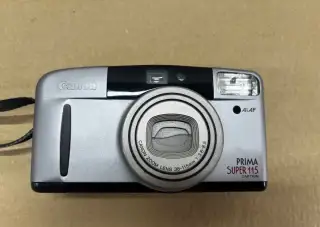 Canon prima super 115 caption