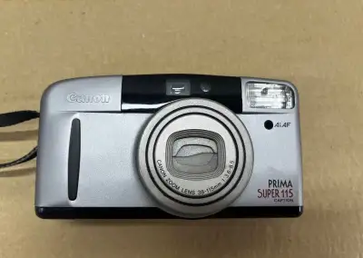 Canon prima super 115 caption