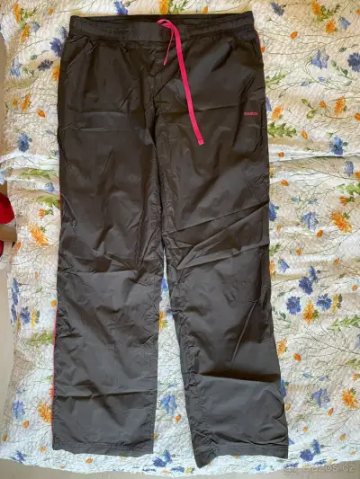 Dámské sportovní šusťákové kalhoty Reebok