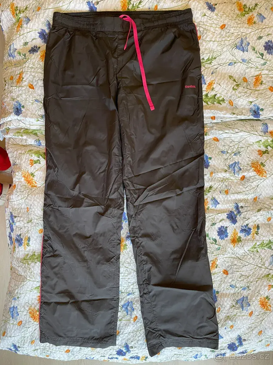 Dámské sportovní šusťákové kalhoty Reebok