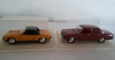 Dva starší modely Schuco 1:66 Audi 100 a Porsche 914 S