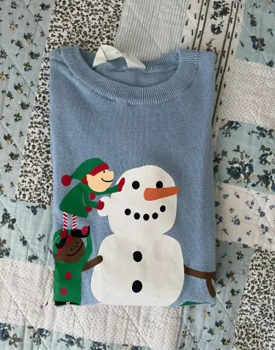 Krásný svetřík,vel.140,zn.H&M