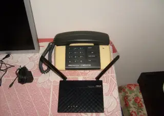 ROUTER ASUS ZA 200KČ