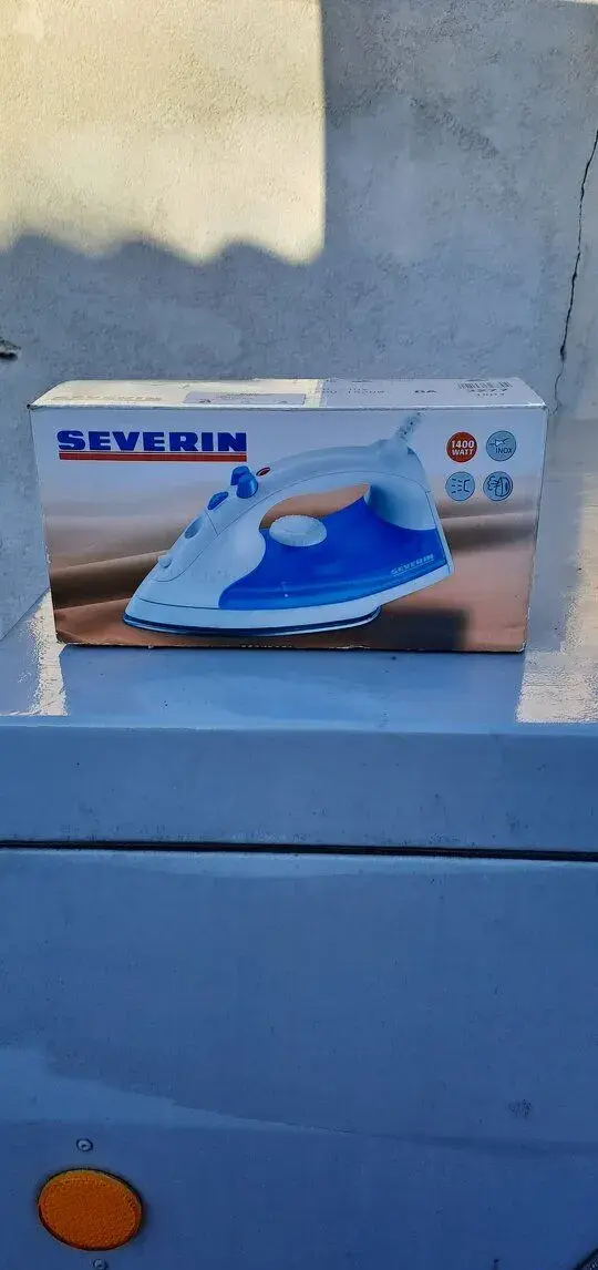 Použitá ale funkční žehlička