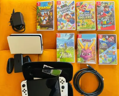 Nintendo Switch OLED White ve velmi pěkném stavu, min