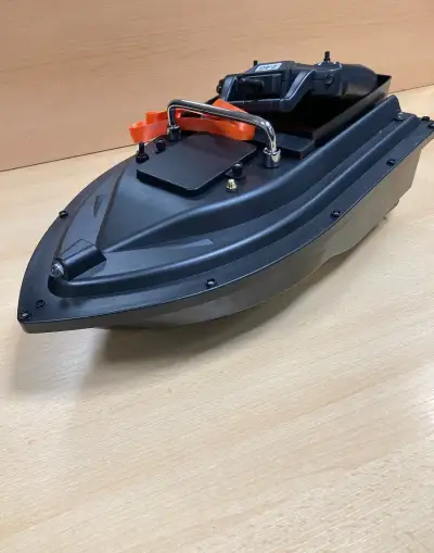 NOVÁ GPS loďka zavážecí na ryby (bat.10000mAh) a obal černý