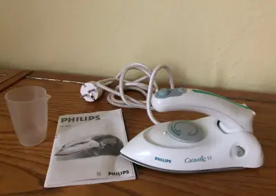 Cestovní napařovací žehlička PHILIPS