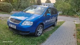 KRÁSNÝ TOURAN