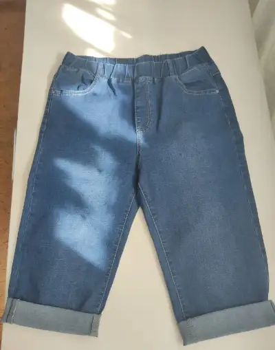 Elastické riflové kalhoty ke kolenům vel.33 v STAVU