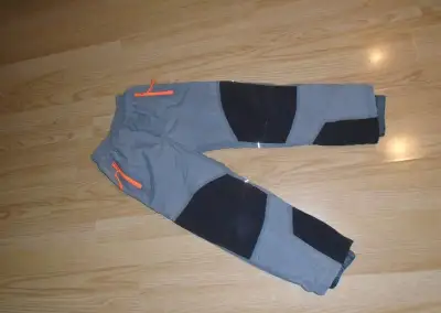 šusťákové kalhoty vel. 122
