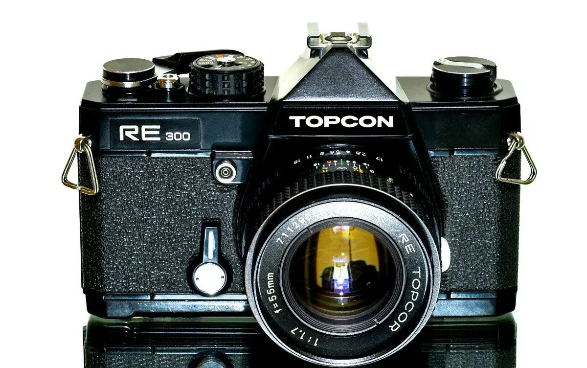 Topcon RE 300 + Topcor RE 1,7/55mm po SERVISU