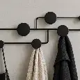 Kovový designový nástěnný věšák