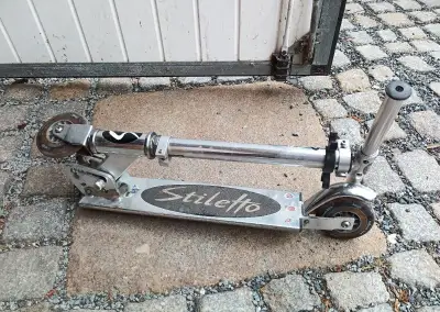 koloběžka skládací 2ks.