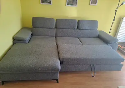 Šedá rozkládací rohová sedačka s úložným prostorem, 280 cm