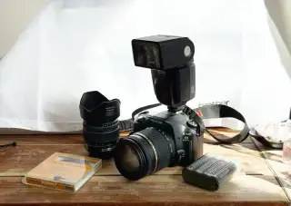 Pentax K100D Super + 18–250 mm + 18–55 mm + Metz
