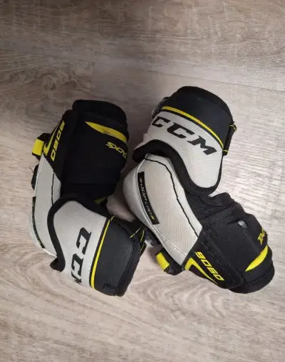 Hokejové chrániče loktů CCM TACKS 9060, vel. junior S