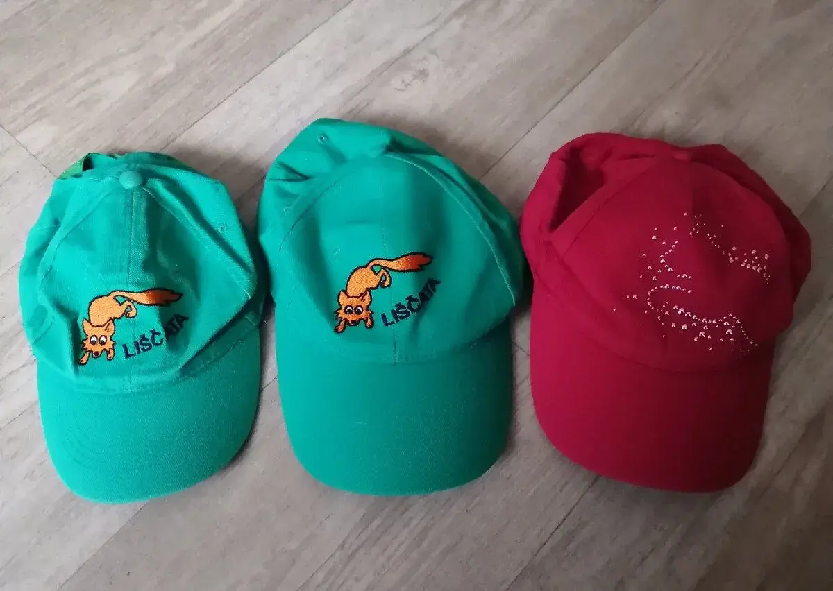 Kšiltovky (zn. PUMA, .) , sáčky na obuv
