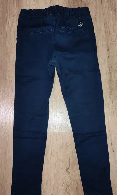 Modré kalhoty zn. F&F vel. 140