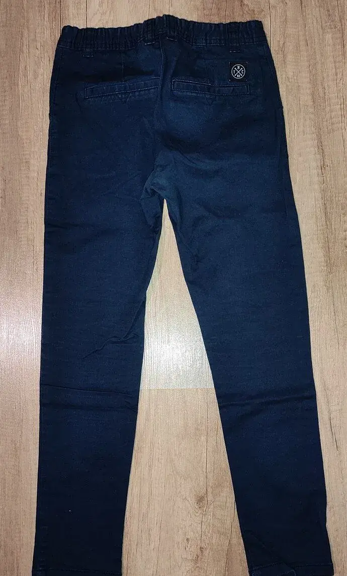 Modré kalhoty zn. F&F vel. 140