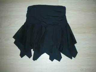dívčí sukně a šaty