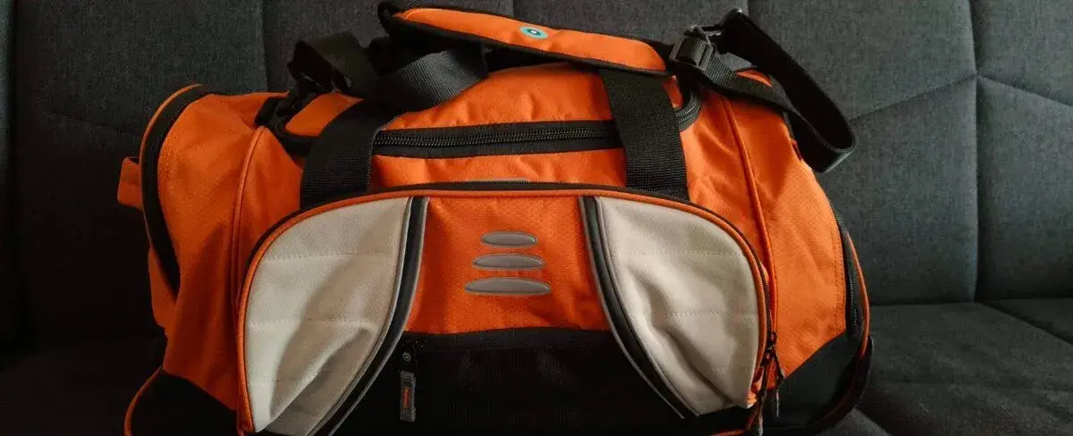 Sportovní taška HUSKY na kolečkách oranžová