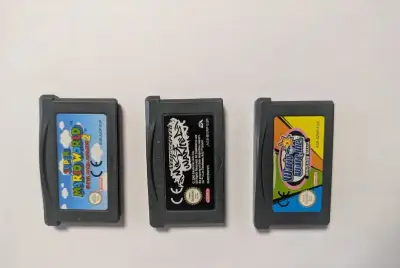Game Boy Advance hry WarioWare + Super Mario Advance 2 + NFS