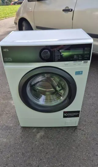 Zánovní pračka AEG