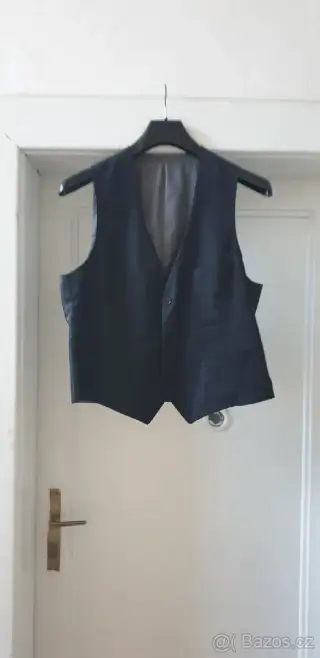 Čerbá obleková vestička XL
