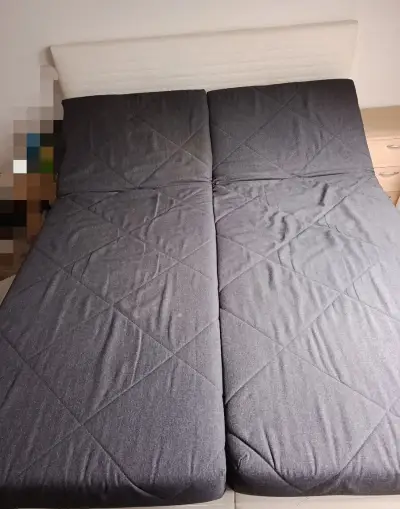Manželská postel s úložným prostorem a polohovatelným lůžkem
