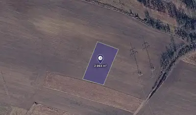 Prodej podílu 1/2 pole 1 497 m², Mělník