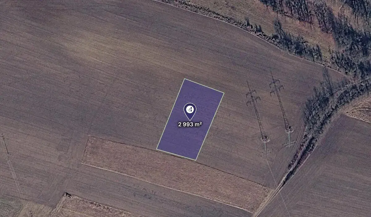 Prodej podílu 1/2 pole 1 497 m², Mělník