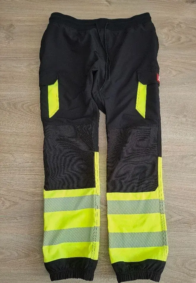 Nové reflexní pracovní kalhoty Urgent 721 XL, černo-žluté
