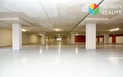 Parkovací místo ve společné garáži bytového domu, Beroun