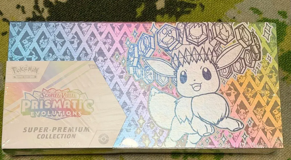 Pokemon sealed produkty - SPC Prismatic, ETB a binder 30th