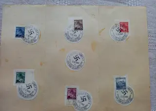 Výstřižky známek s příležitostnými razítky