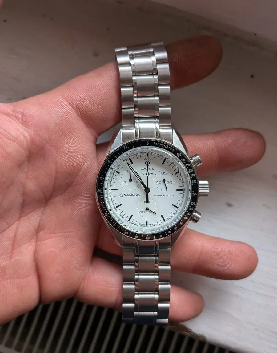 Omega&Swatch v nerez pouzdře